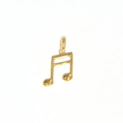Ciondolo nota musicale in oro giallo 18 kt della collezione de Stefano. Misura 0,8 cm. Peso 0,5 gr.